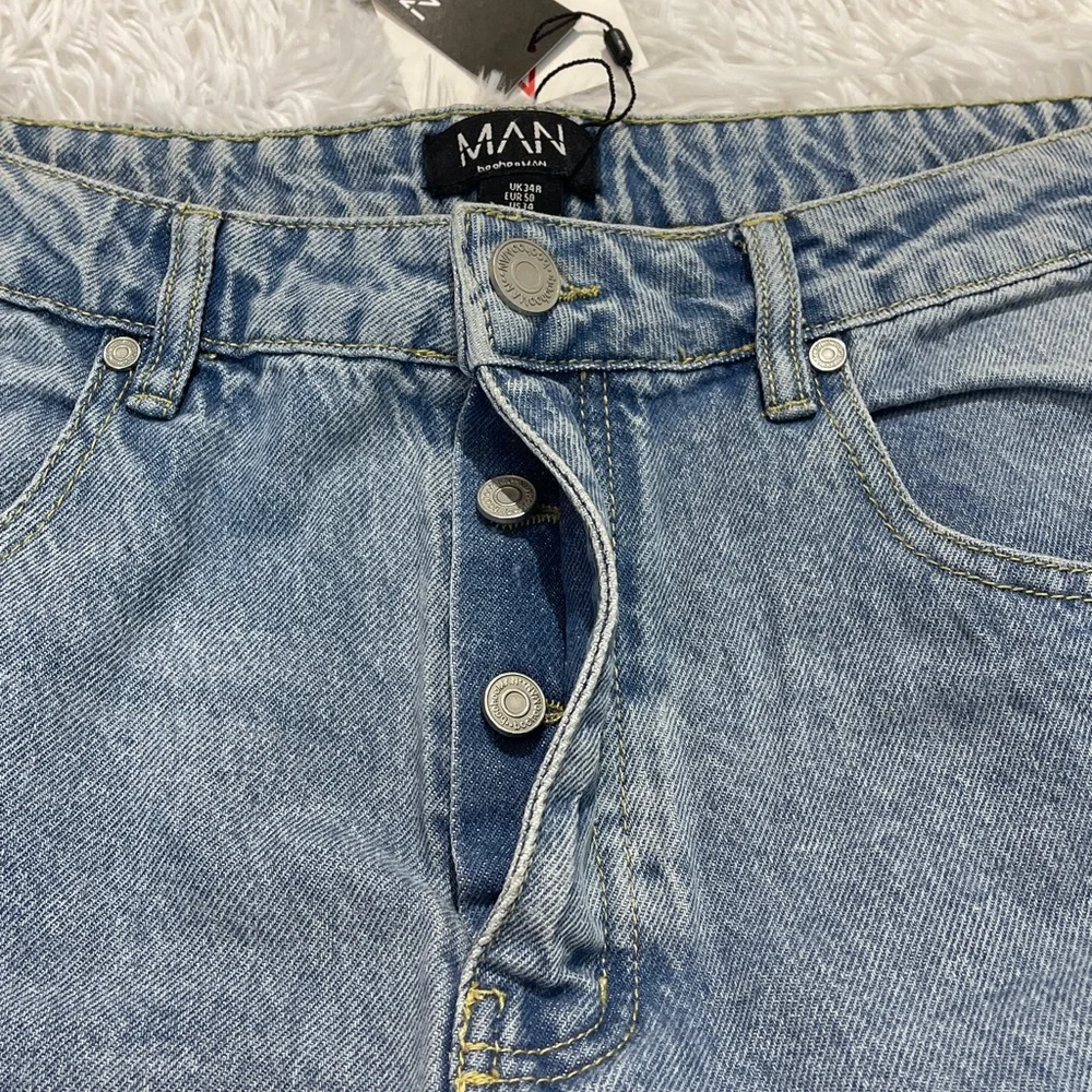 BOOHOO MAN WOMENS Distressed Light Blue Jeans WIDE LEG SIZE.  WAIST 34
